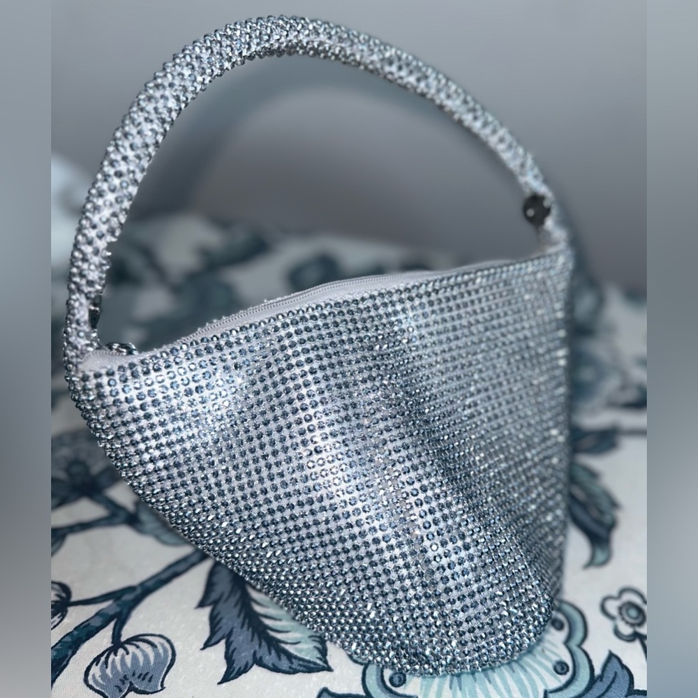 Elegant silver rhinestone handbag, add some glamour to any outfit.